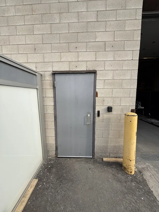 The same door at Slough before Access Installs replaced it